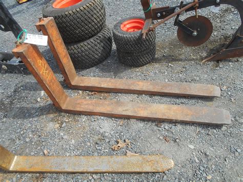 skid steer pallet forks minnesota|skid steer pallet fork extensions.